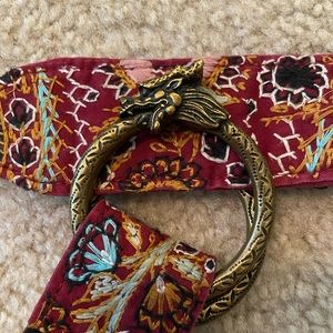 Multi colored dragon buckle belt